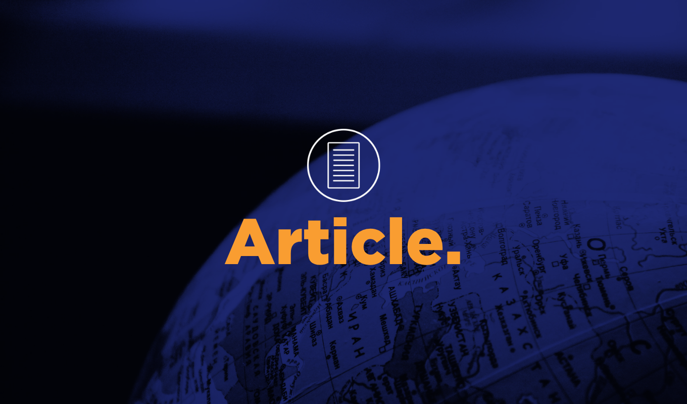 Close-up of a world globe with article icon and headline overlay representing international growth.