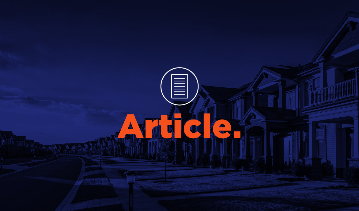 Article thumbnail showing a residential neighborhood with multiple homes along a street.
